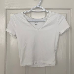 white lightly used crop top